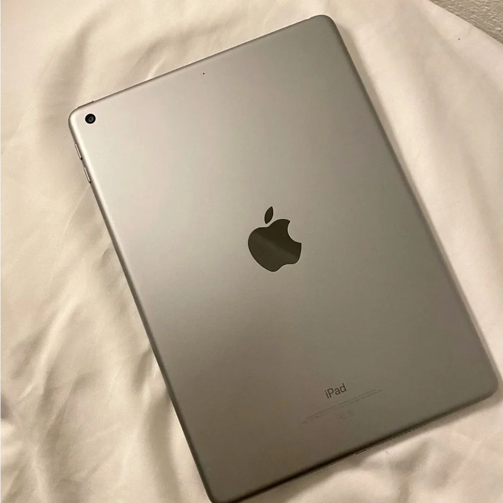 Apple Tablet with Vibrant Red and Blue Display